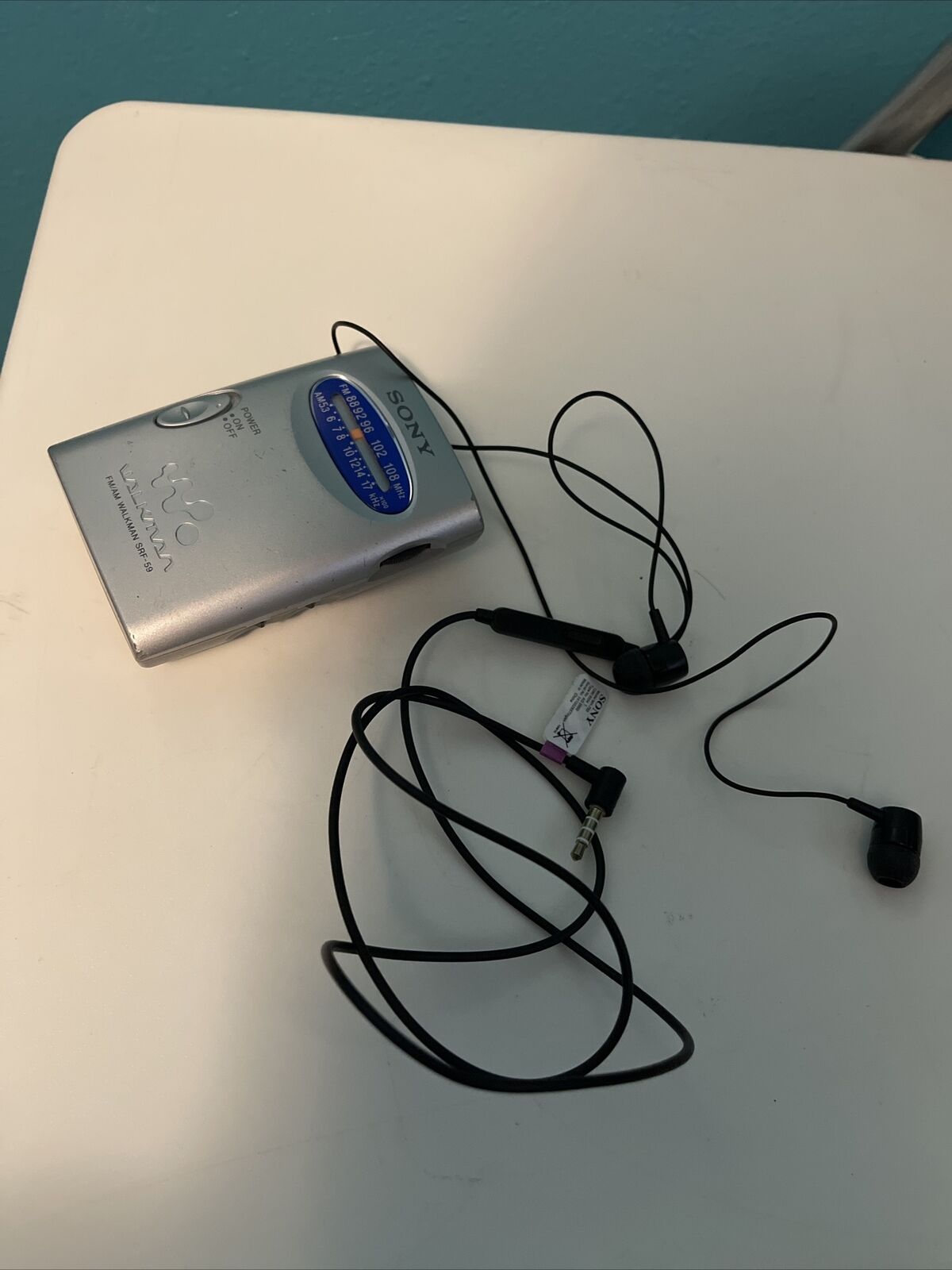 Sony SRF59 AM/FM Walkman Radio - Silver With Sony Headphones