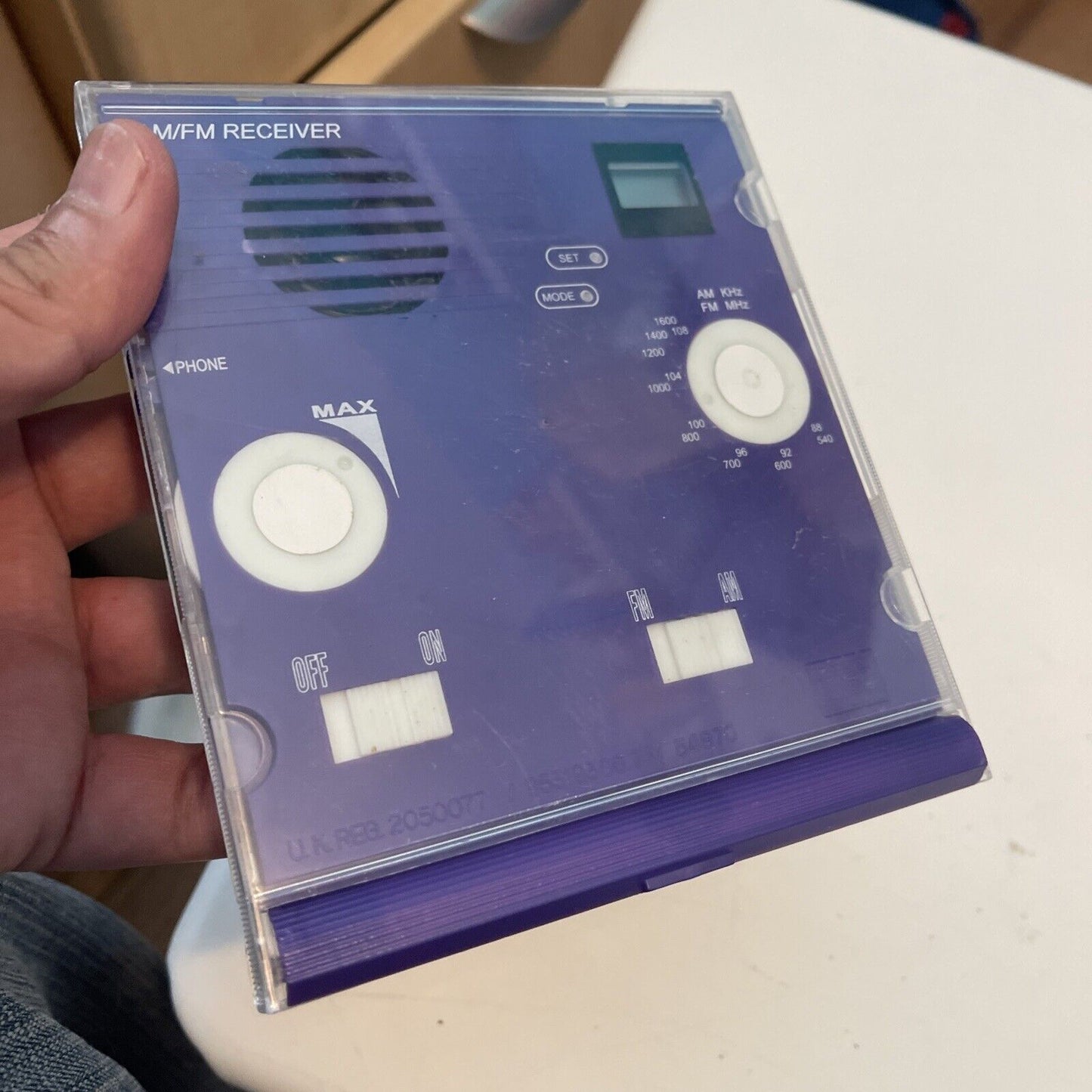 AM/FM Receiver in a Purple CD Jewel Case See through Clear