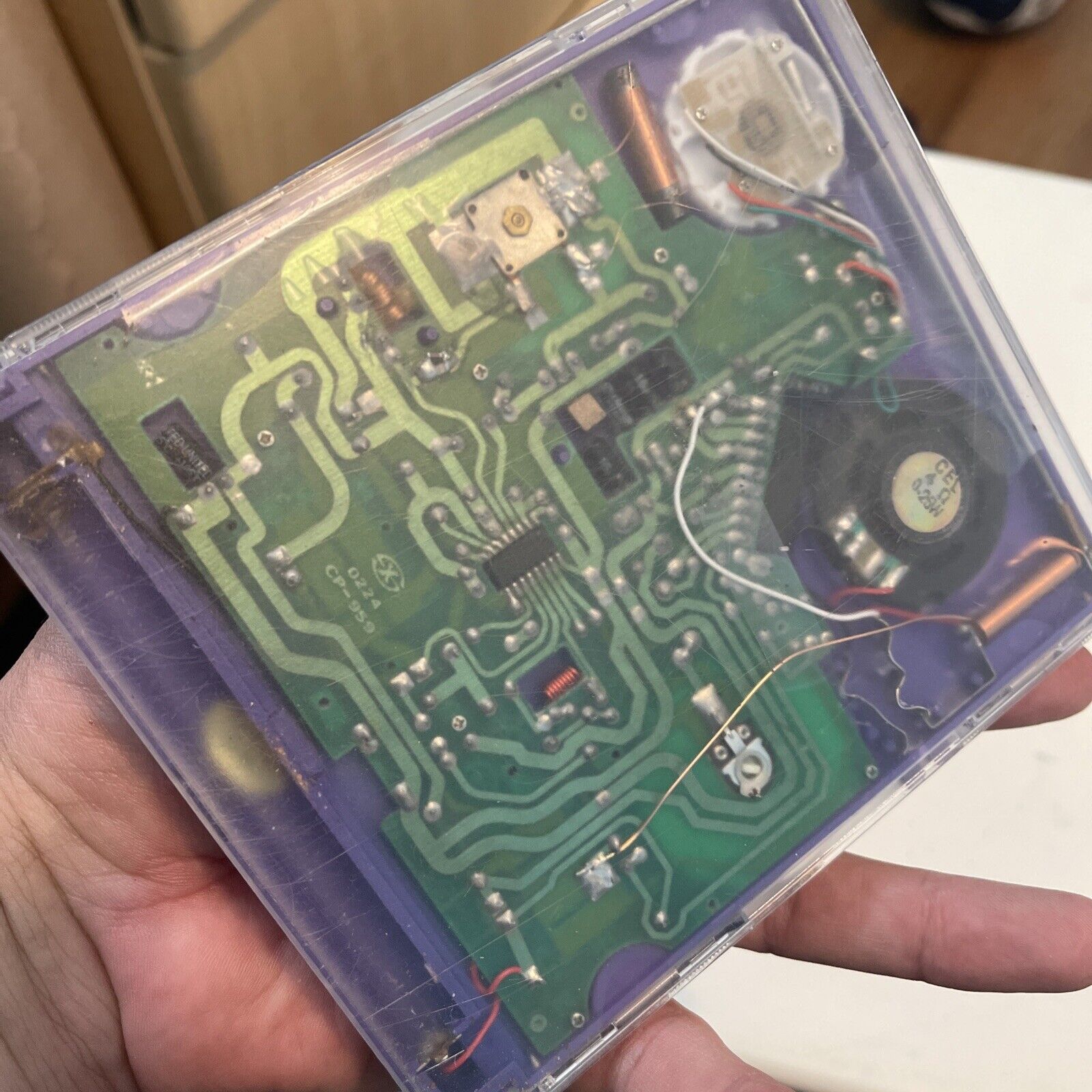 AM/FM Receiver in a Purple CD Jewel Case See through Clear