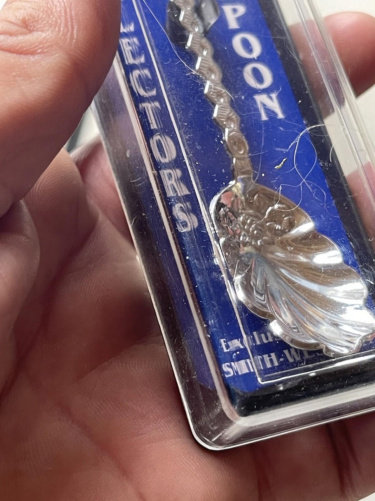 Mount Saint Helens, Washington (top) on Souvenir Spoon